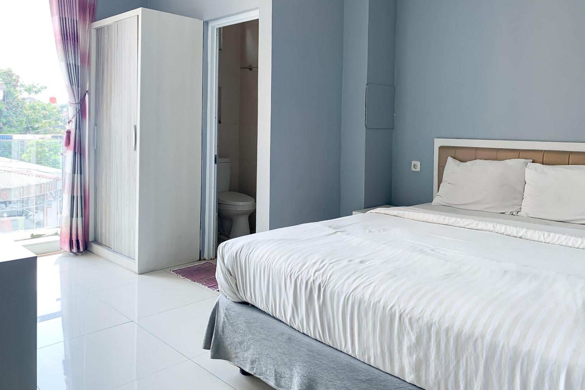 Karins Guesthouse Syariah Redpartner บันดุง ภายนอก รูปภาพ